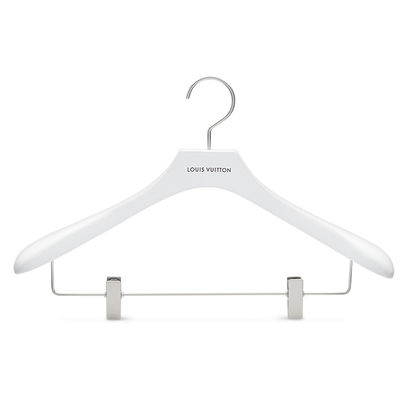 Wooden jacket hanger with clips made from FSC beechwood with matt painted finish, matte nickel metal parts and printed logo for Louis Vuitton