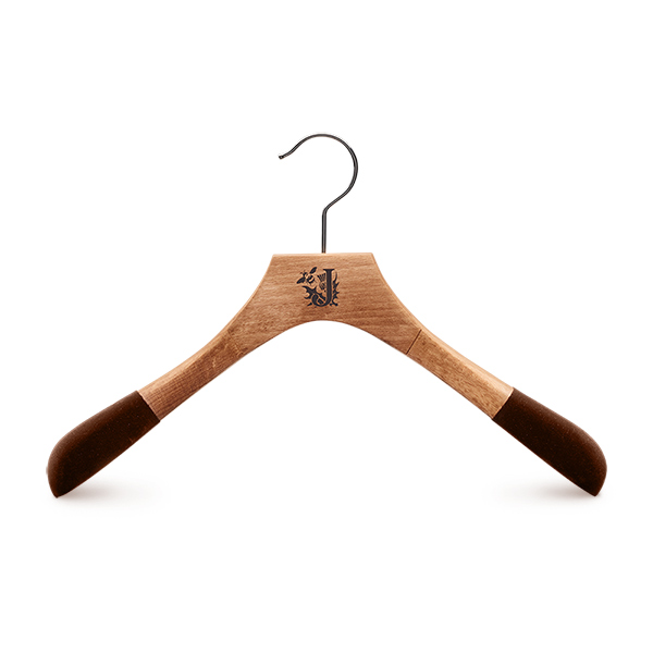 Wooden jacket hanger made from FSC beechwood with varnish and velvet finish, gunmetal metal parts and printed logo for Johnstons of Elgin